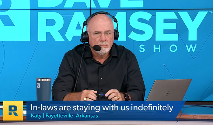 Radio host Dave Ramsey wearing headset, responding to a desperate newlywed caller about relationship and family issues.