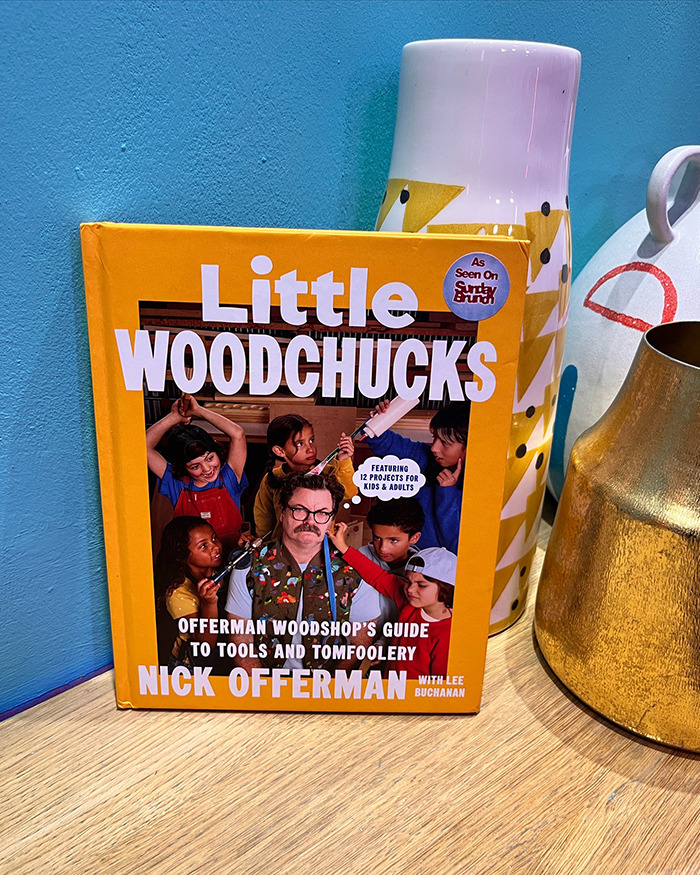 Nick Offerman's book Little Woodchucks displayed with colorful design highlighting woodworking projects for kids and adults.