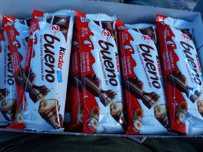 Several Kinder Bueno chocolate bars neatly arranged in a box, illustrating a lucrative loophole strategy.