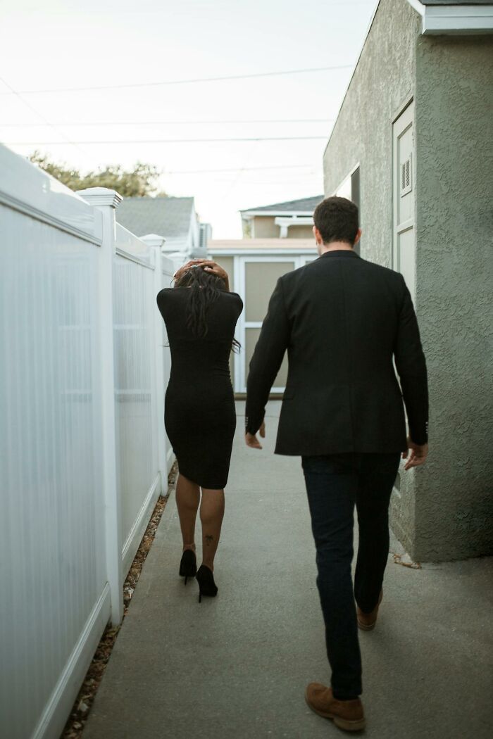 Couple walking away in a narrow alley, depicting the harsh truths about marriage and challenges faced in relationships.