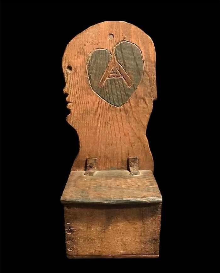 Very old wooden box carved with a heart and letter A, an object showing history and stories of our ancestors.
