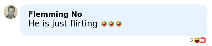 Screenshot of a social media comment saying he is just flirting with laughing emojis in a casual conversation.