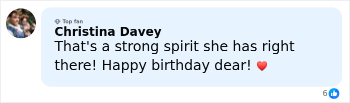 Comment praising a woman born without most of her brain on her 20th birthday, expressing admiration and birthday wishes.