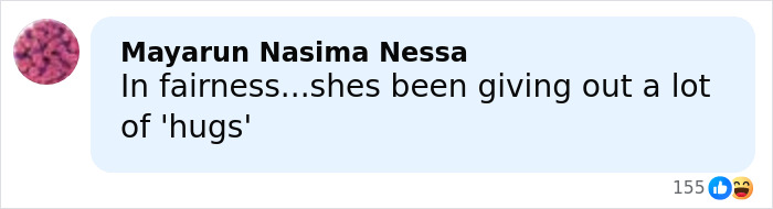 Text message conversation showing a comment about giving out a lot of hugs related to Erika Kirk and JD Vance incident.