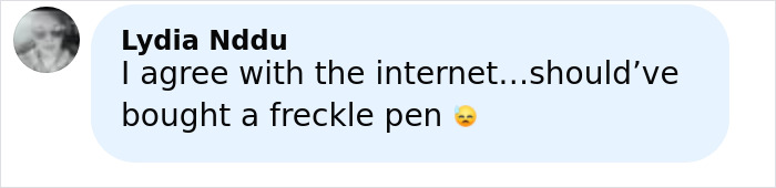 Comment from Lydia Nddu agreeing with the internet, saying she should have bought a freckle pen instead of tattooing freckles.