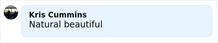 User comment on social media post reading Natural beautiful in black text on a light blue background.
