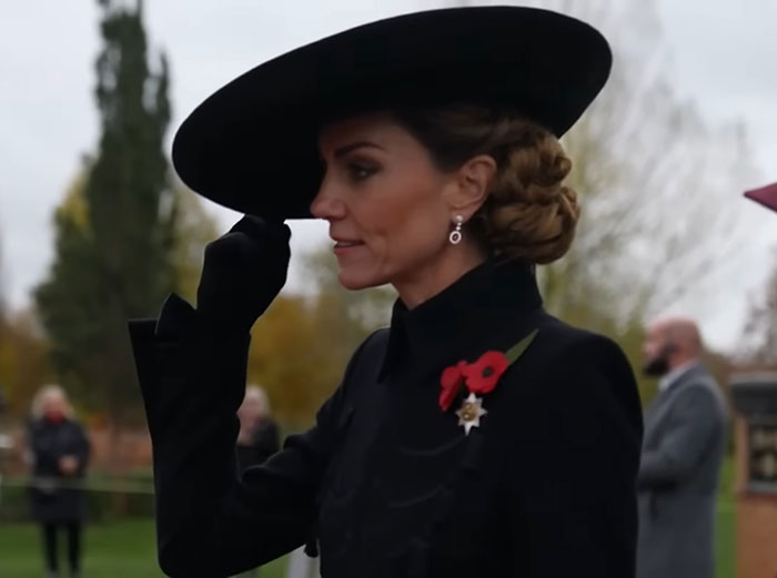 Princess Kate in black outfit and hat, attending a public event amid BBC headline backlash over the royal appearance.
