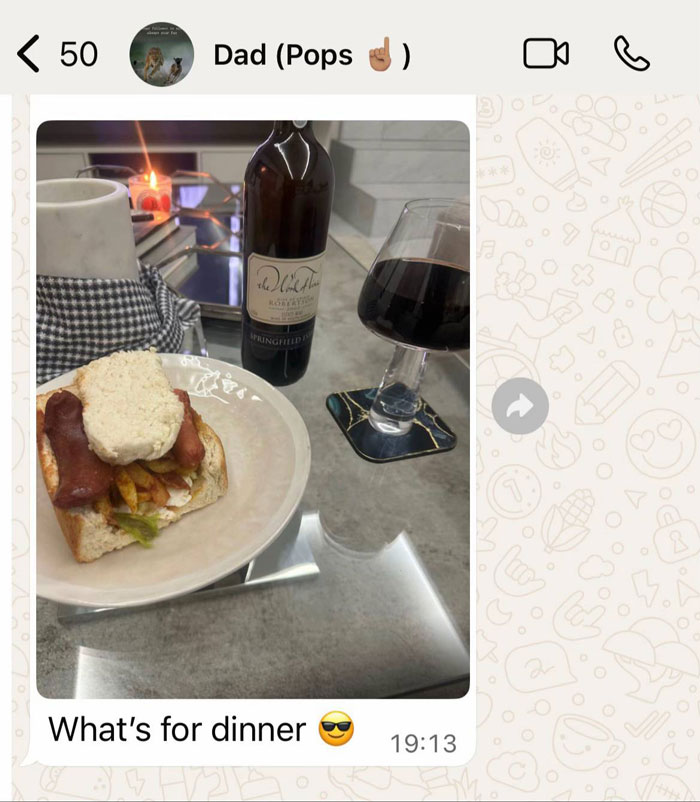 Screenshot of unhinged text message from parent showing a hot dog sandwich with wine, reflecting hilarious parent texts trend.