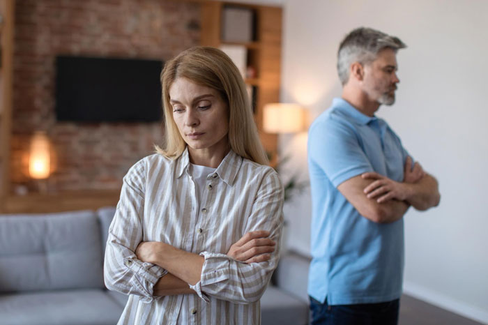 Woman refusing to pay for dad&rsquo;s lovechild&rsquo;s surgery with inheritance money, dad looks upset in home setting.