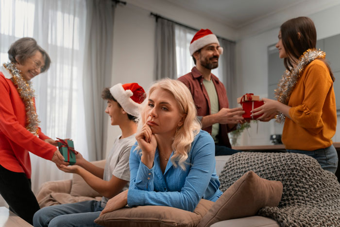 Young woman looks unprepared for wild family Christmas with screaming matches and alcohol-fueled fights around her.