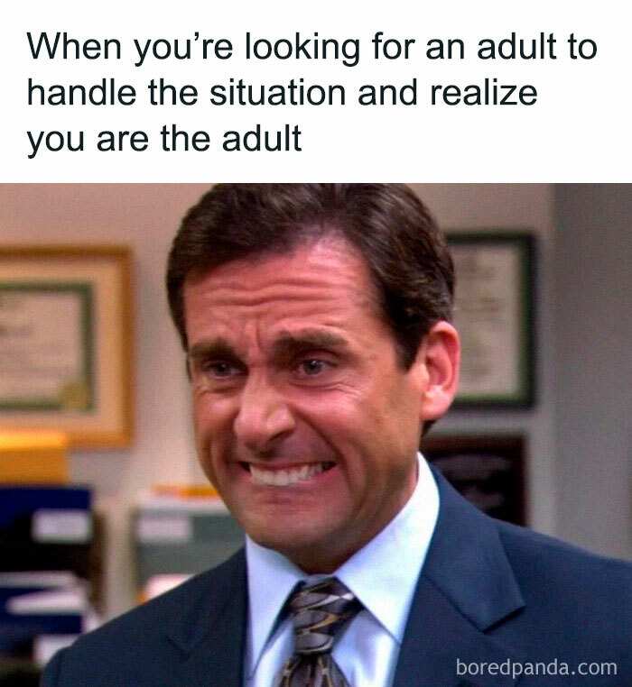 Man in office suit making a tense face, illustrating self-deprecating memes feel personally attacked humor.