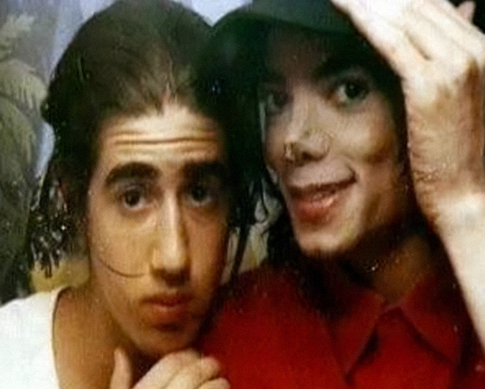 Michael Jackson with a sibling in a candid photo highlighting siblings&rsquo; disturbing new allegations amid biopic trailer release.