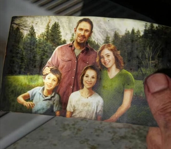 Photo of a family holding a picture, representing nepo babies sharing insider experiences in a natural outdoor setting.
