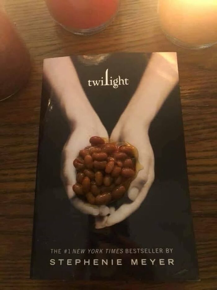Book cover of Twilight edited with beans replacing the heart, a stupid food meme for stupid people on a wooden table.