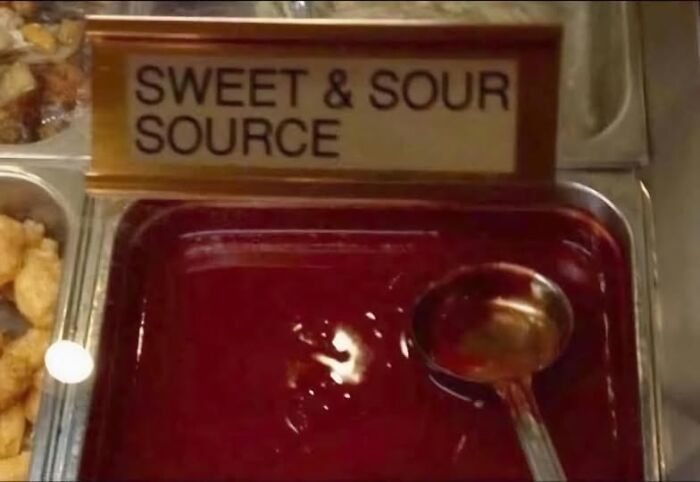Empty sauce container labeled sweet and sour source, highlighting a funny food meme with a spelling mistake.