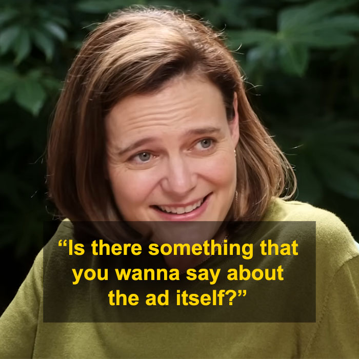 Woman with shoulder-length hair wearing a green top, smiling while discussing Sydney Sweeney jeans scandal comments.