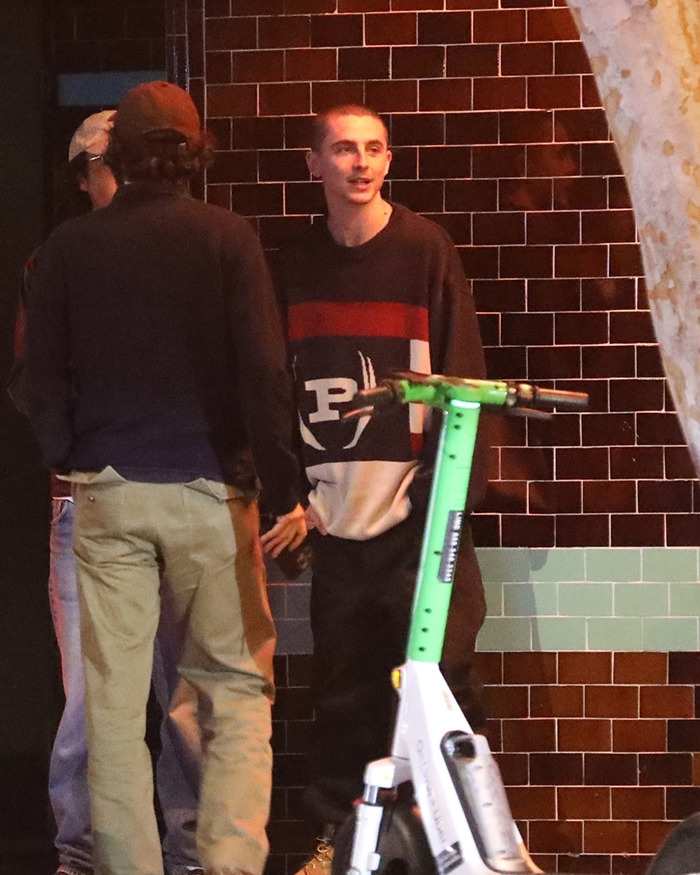 Timothée Chalamet enjoying a guys’ night out in Hollywood, casually dressed and chatting by a tiled wall. Timothée Chalamet enjoying a guys’ night out in Hollywood, casually dressed and chatting by a tiled wall.
