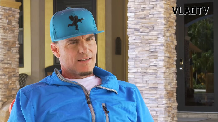 Man in a blue jacket and cap sitting outdoors during an interview for a story about receiving a car as a tip.