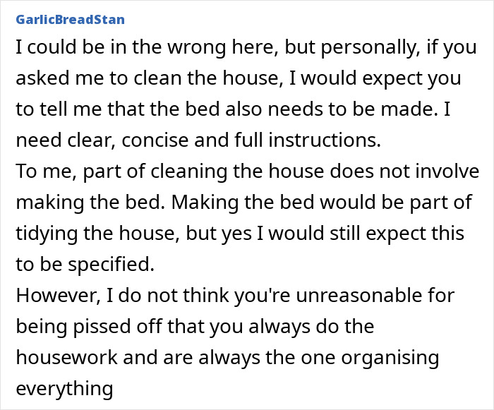 Woman prepares feast and fun for family while husband moody, only opening the oven door in a kitchen setting.