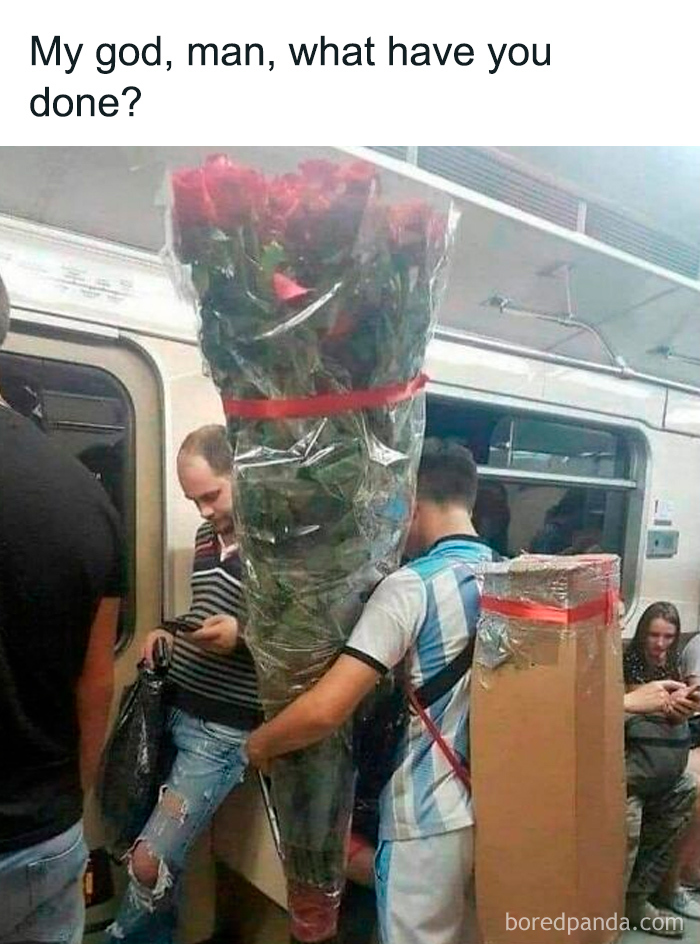 Man holding an oversized bouquet of roses on crowded public transport, a humorous scene from funny memes collection.