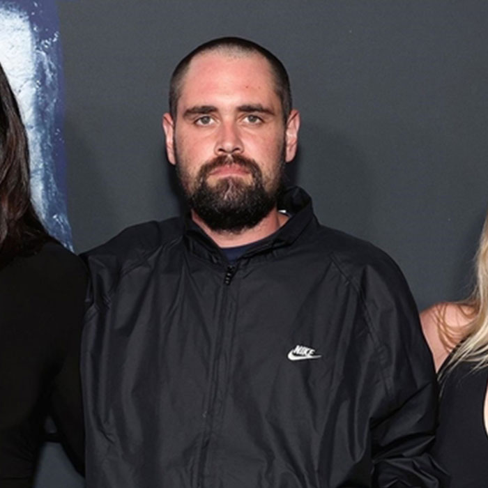 Man with beard and short hair wearing a black Nike jacket attending a public event related to Rob Reiner&rsquo;s son arrest news