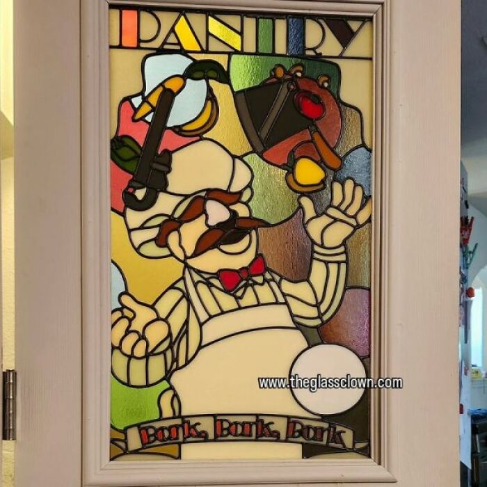 Stained glass pantry sign featuring a vivid pop culture icon of a chef with a red bow tie and cooking utensils.