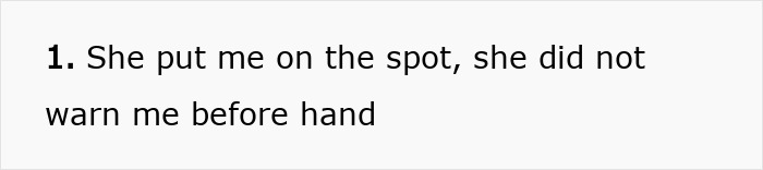 Woman standing firm, not giving in to social pressure from coworkers, remaining confident despite awkwardness. Woman standing firm, not giving in to social pressure from coworkers, remaining confident despite awkwardness.