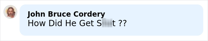 Comment from John Bruce Cordery asking how he got hurt, displayed in a light blue chat bubble with a blurred word.
