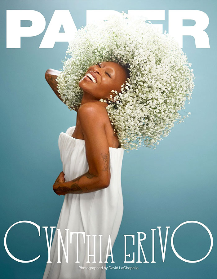 Cynthia Erivo on magazine cover wearing white dress and large flower headpiece celebrating Wicked For Good success Cynthia Erivo on magazine cover wearing white dress and large flower headpiece celebrating Wicked For Good success