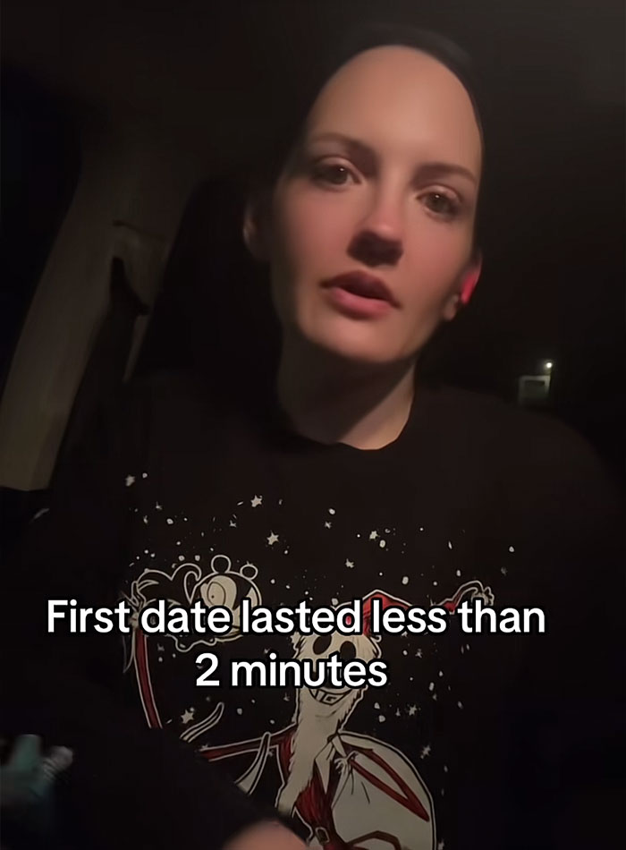 Woman leaves date in less than 2 minutes after catching on to his plan, looking frustrated and speaking in dim light.