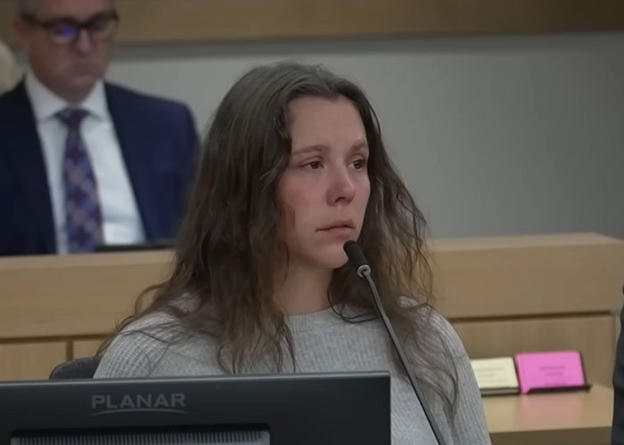 Female teacher with long hair sobbing in courtroom during sentencing hearing about texting student incident