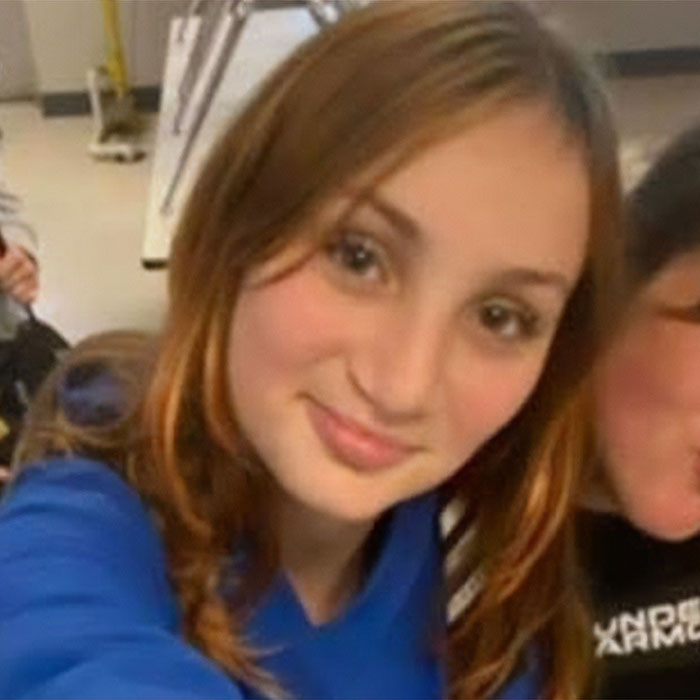 Teen girl smiling in casual setting, related to news about teens charged with homicide after brutal attack. Teen girl smiling in casual setting, related to news about teens charged with homicide after brutal attack.