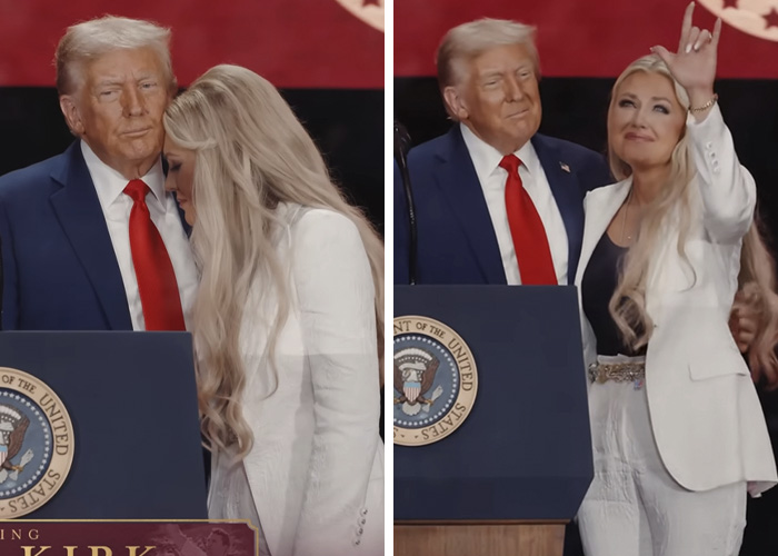 Erika Kirk standing beside a man in a suit during a public event, capturing controversial moments since husband passed.