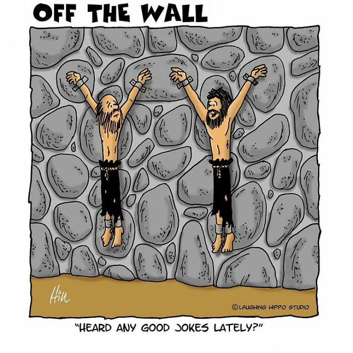 Two men chained to a stone wall in a humorous one-panel comic by Laughing Hippo Studio.