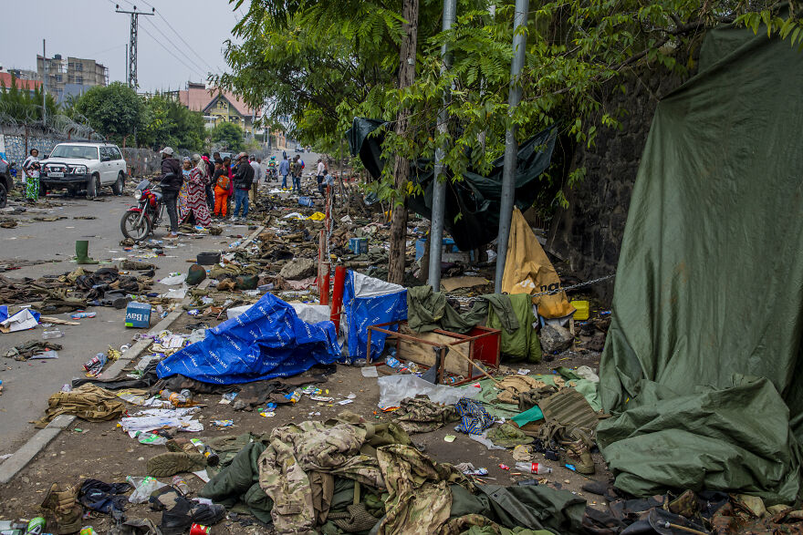 Street covered with trash and debris in one of the top dirtiest countries in the world with high pollution levels and waste accumulation.