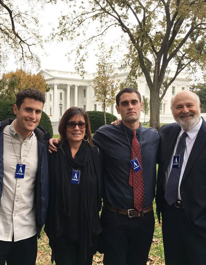 Group of four people posing outside the White House, related to Nick Reiner and his startling diagnosis before homicides.