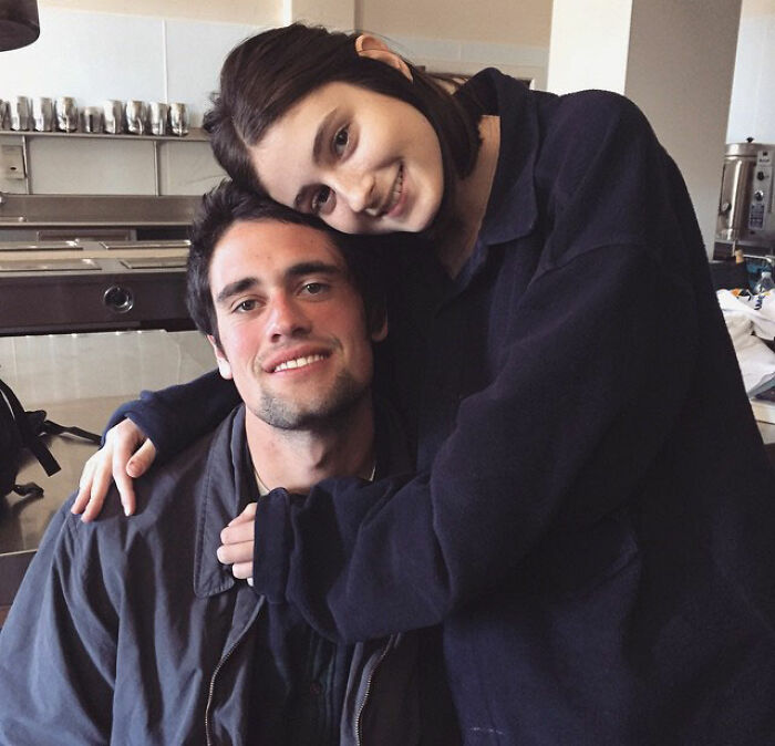 Romy Reiner hugging brother Nick, showing sibling bond in casual setting, highlighting Rob Reiner&rsquo;s daughter and son relationship.