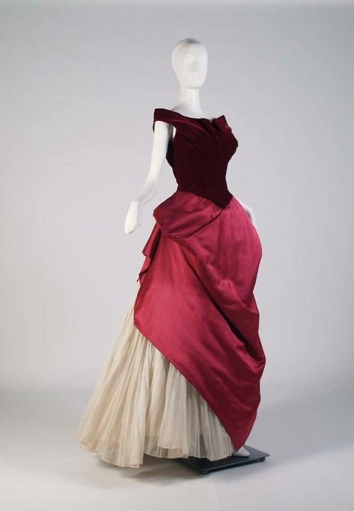 Vintage elegant dress on mannequin showcasing culture and everyday life in the past through powerful old photos.