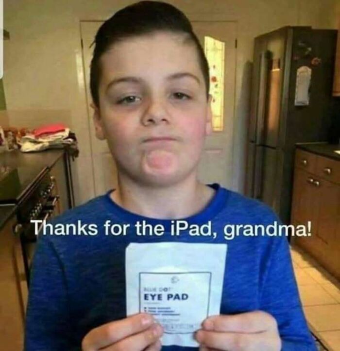 Boy holding an eye pad with a sarcastic expression, one of the hilarious memes that make you forget stress.