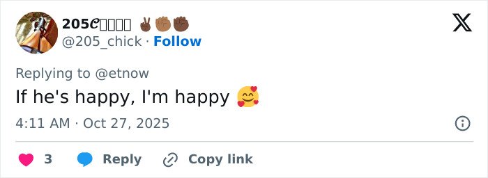 Screenshot of a social media reply discussing Hugh Jackman&rsquo;s red carpet appearance with Sutton Foster amid divorce controversy.