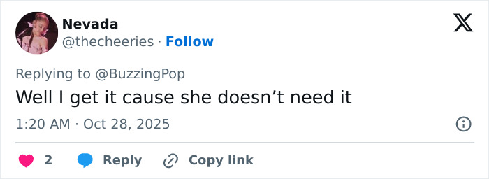 Screenshot of a social media reply defending Sydney Sweeney amid plastic surgery rumors with an angry tone. Screenshot of a social media reply defending Sydney Sweeney amid plastic surgery rumors with an angry tone.