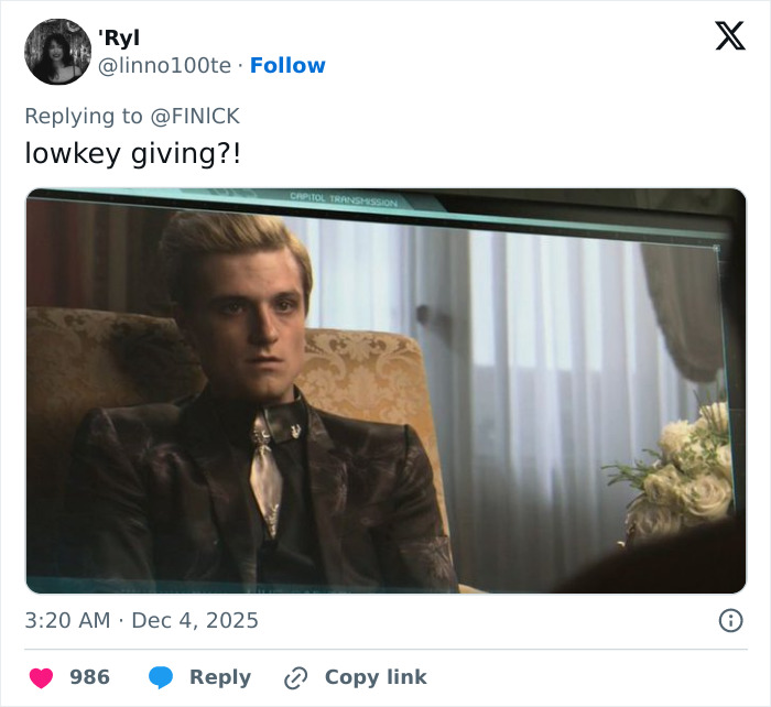 Ethan Hawke in a dark suit sitting in an ornate chair with neutral expression, sparking online firestorm with Sydney Sweeney pairing.