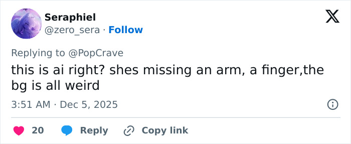 Screenshot of a social media reply pointing out a bizarre detail in a photo shared by Rebel Wilson with Ariana Grande.