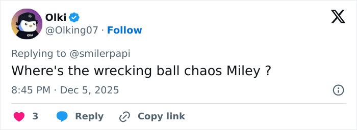 Screenshot of a social media reply commenting on Miley Cyrus&rsquo;s youthful glow and viral makeover after taking veneers out.