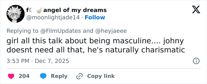 Screenshot of a Twitter reply discussing masculinity, referencing David Corenswet's perspective on 1950s masculinity.