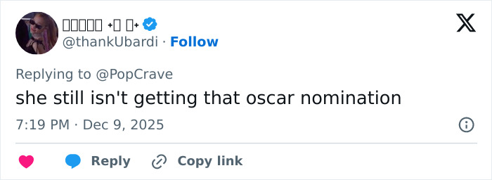 Sydney Sweeney posing for Sports Illustrated cover, fans noticing an odd detail sparking online discussion.