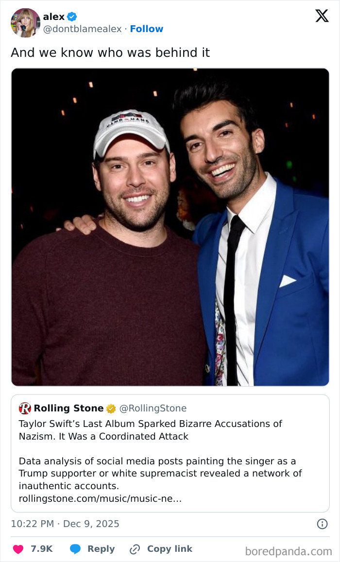 Two men smiling together at an event, illustrating the topic of Taylor Swift targeted by fake white-nationalist conspiracy claims.