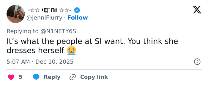 Tweet discussing Sydney Sweeney fans spotting an odd detail in the Sports Illustrated cover with a crying emoji.