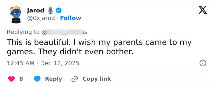 Screenshot of a social media reply discussing feelings about parenting in relation to a viral mother-son photoshoot debate.