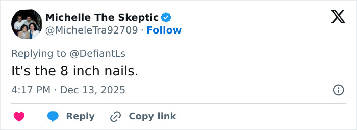 Tweet discussing Cynthia Erivo's oddly large hands and the debate surrounding her hand appearance and style choices.